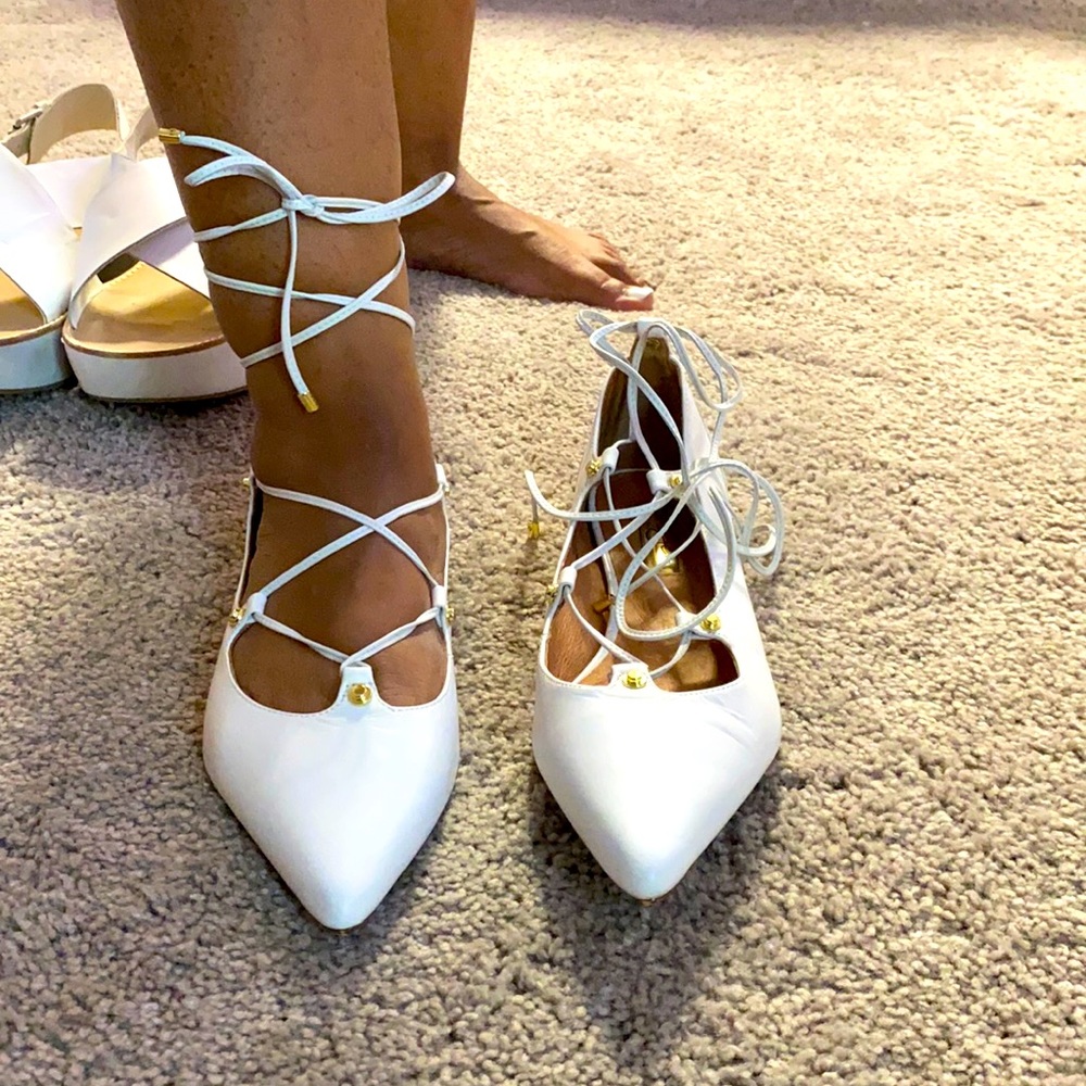 Pure white hydrogen shoes lace up